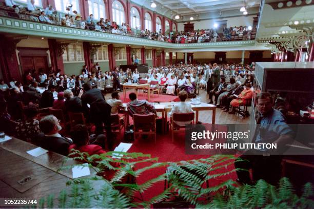 People take part at the opening session of the Truth and Reconciliation Commission on April 15, 1996 at East London. The commission is probing...