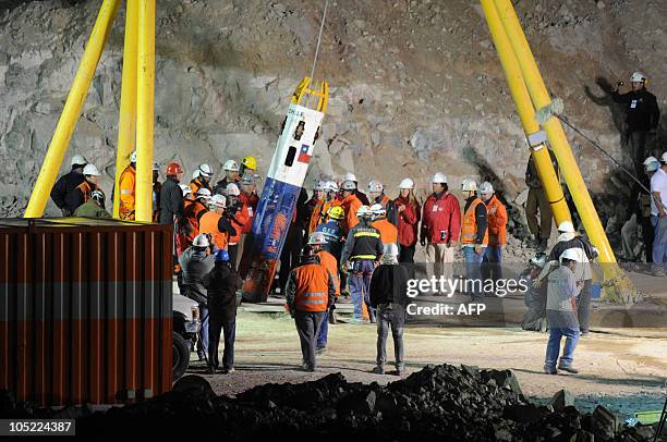 Rescuer Manuel Gonzalez gets into the Fenix capsule, starting the rescue operation of the 33 trapped miners,at the San Jose mine, near Copiapo, Chile...