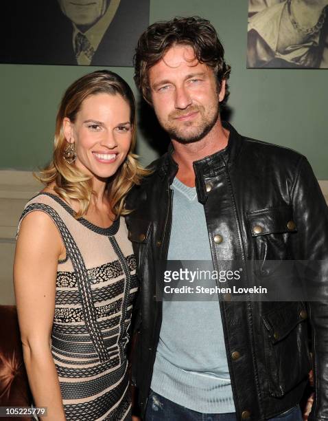 Actress Hilary Swank and actor Gerard Butler attend the Cinema Society & Laura Mercier host the after party for "Conviction" at Soho Grand Hotel on...