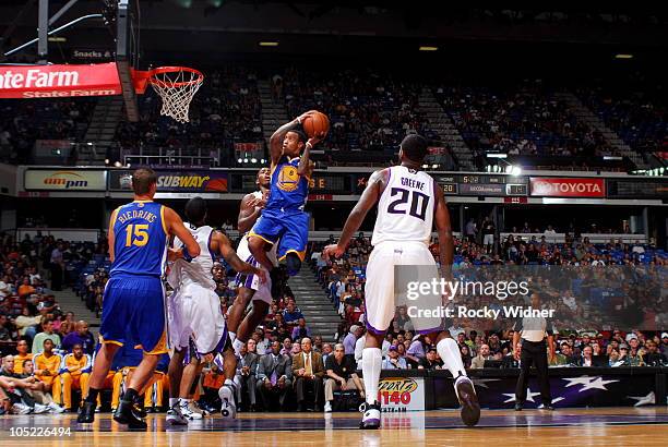 Monta Ellis of the Golden State Warriors takes the ball to the basket against the Sacramento Kings during a preseason game on October 12, 2010 at...