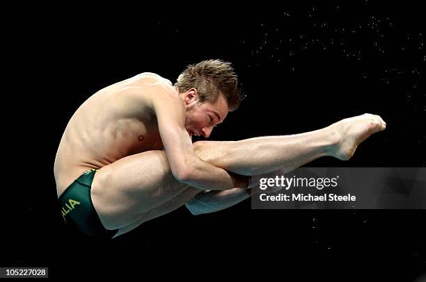 Matthew Mitcham of Australia competes in the Men's 10m Platform Preliminary at the Dr. S.P. Mukherjee Aquatics Complex during day ten of the Delhi...