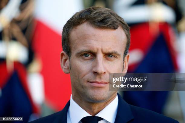 French President Emmanuel Macron listens to Croatian Prime Minister Andrej Plenkovic's statement to the press prior to their meeting at the Elysee...