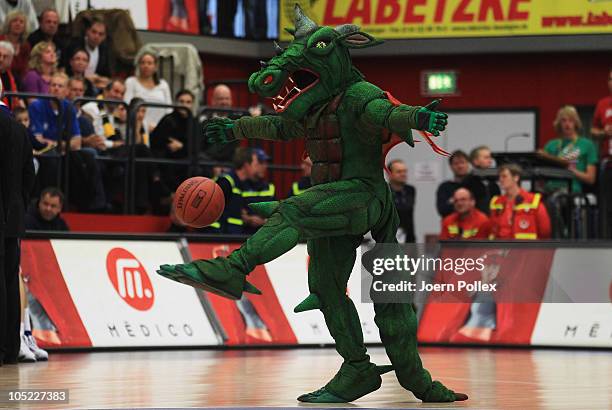 Mascott Tobi of Quakenbrueck controlls the ball prior to during the Basketball Bundesliga match between Artland Dragons and Alba Berlin at the...