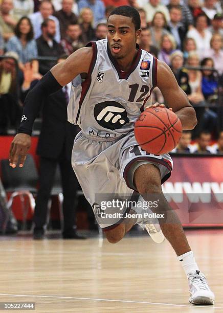 Bryan Bailey of Quakenbrueck controls the ball during the Basketball Bundesliga match between Artland Dragons and EWE Baskets Oldenburg at the...