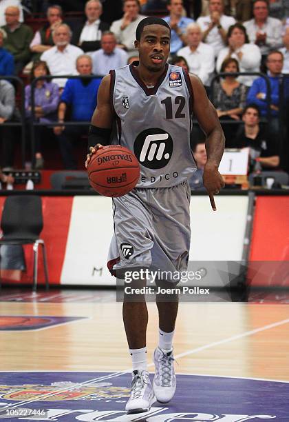 Bryan Bailey of Quakenbrueck controls the ball during the Basketball Bundesliga match between Artland Dragons and EWE Baskets Oldenburg at the...