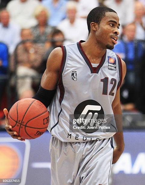 Bryan Bailey of Quakenbrueck controls the ball during the Basketball Bundesliga match between Artland Dragons and EWE Baskets Oldenburg at the...