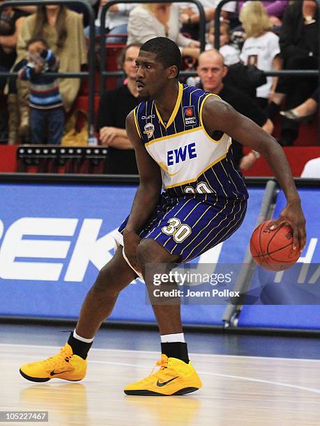 Steven Smith of Oldenburg controls the ball during the Basketball Bundesliga match between Artland Dragons and EWE Baskets Oldenburg at the Artland...