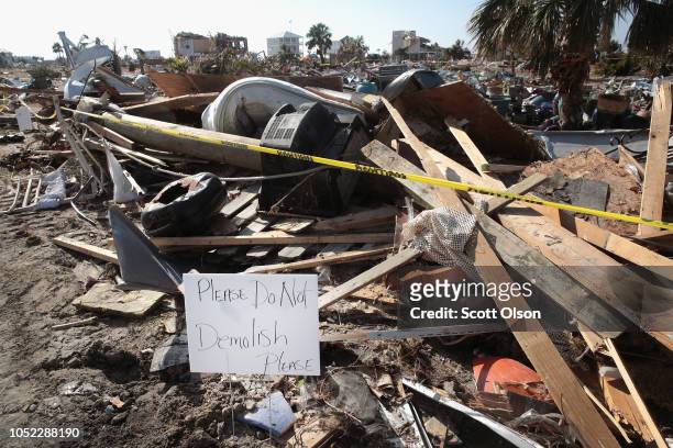 Business owner whose business was destroyed by Hurricane Michael tries to prevent workers from scrapping what little remains on October 16, 2018 in...
