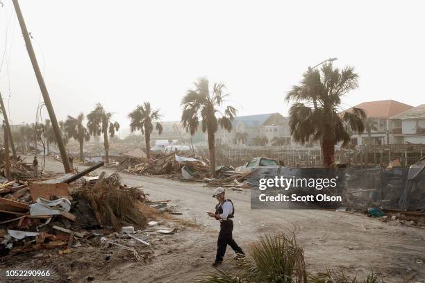 Members of the Maryland Task Force urban search and rescue team continue to search for victims of Hurricane Michael on October 16, 2018 in Mexico...