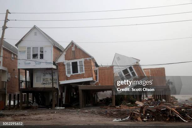 Fog surrounds homes damaged by Hurricane Michael on October 16, 2018 in Mexico Beach, Florida. Hurricane Michael slammed into the Florida Panhandle...