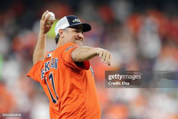 Former Houston Astros player Lance Berkman throws out the ceremonial first pitch before Game Three of the American League Championship Series between...