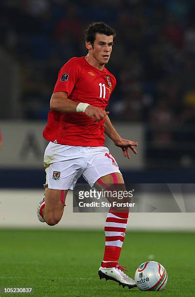 Wales player Gareth Bale in action during the EURO 2012 Group G Qualifier between Wales and Bulgaria at Cardiff City Stadium on October 8, 2010 in...