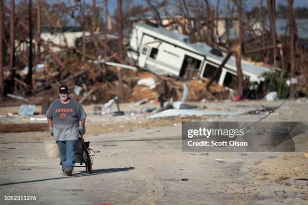 Rick Kitchen recovers items from his RV after it was destroyed during Hurricane Michael on October 16, 2018 in Mexico Beach, Florida. Hurricane...