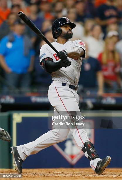 Jackie Bradley Jr. #19 of the Boston Red Sox hits a grand slam home run in the eighth inning against the Houston Astros during Game Three of the...