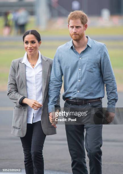 Meghan, Duchess of Sussex and Prince Harry, Duke of Sussex attend a naming and unveiling ceremony for the new Royal Flying Doctor Service aircraft at...