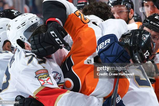 Frank Vatrano of the Florida Panthers and Michael Raffl of the Philadelphia Flyers mix it up at the Wells Fargo Center on October 16, 2018 in...