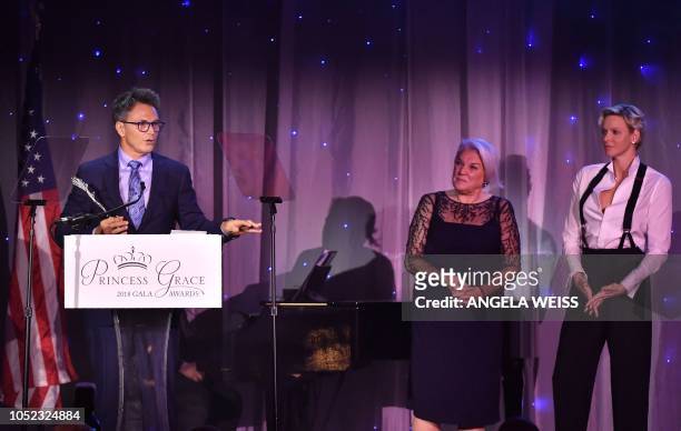 Actor and director Tim Daly speaks after receiving the Prince Rainier III Award as US actress and mother Tyne Daly and Princess Charlene of Monaco...