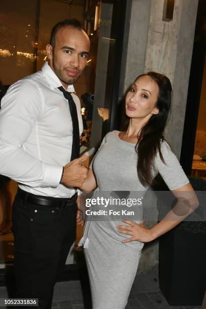 Karateka champion Djema Belkhodja and actress/blogger Celine Tran attends the 'Champion Spirit' Rive Gauche Launch Party at Beaupassage 14 Bd Raspail...