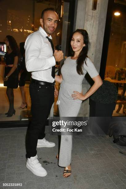 Karateka champion Djema Belkhodja and actress/blogger Celine Tran attends the 'Champion Spirit' Rive Gauche Launch Party at Beaupassage 14 Bd Raspail...