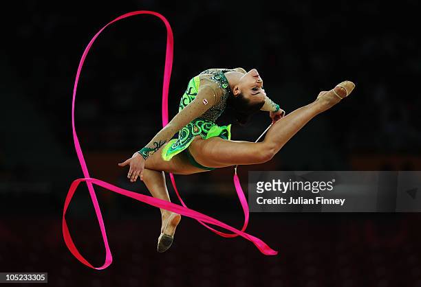 Mariam Chamilova of Canada performs with the ribbon as she competes in the in the All-Around Rhythmic Gymnastics Final at Indira Gandhi Sports...