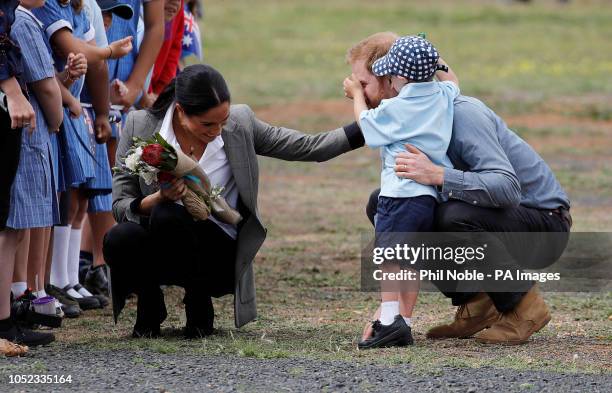The Duke and Duchess of Sussex talk to Luke Vincent after arriving at Dubbo airport, in Australia, on the second day of their tour to the country.