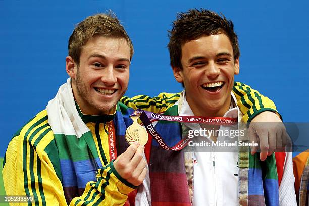 Matthew Mitcham and Tom Daley of England pose with the medals won in the Men's 10m Platform Final at the Dr. S.P. Mukherjee Aquatics Complex during...