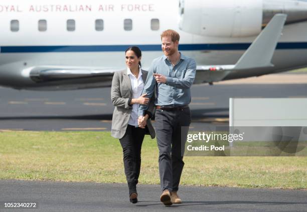 Prince Harry, Duke of Sussex and Meghan, Duchess of Sussex arrive at Dubbo Airport on October 17, 2018 in Dubbo, Australia. The Duke and Duchess of...