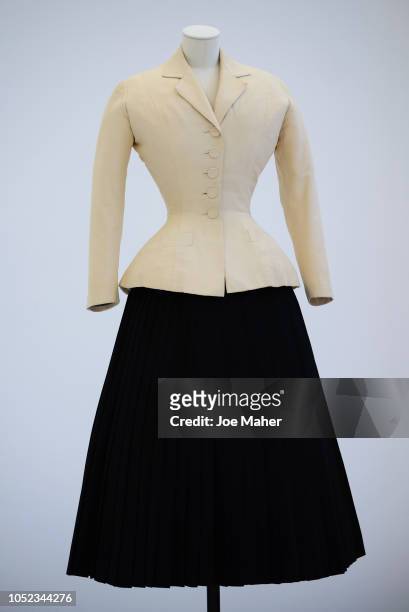 Christian Dior , Bar Suit, Haute Couture, Spring/Summer 1947, Carolle Line on display at a press conference for the Christian Dior: 'Designer Of...
