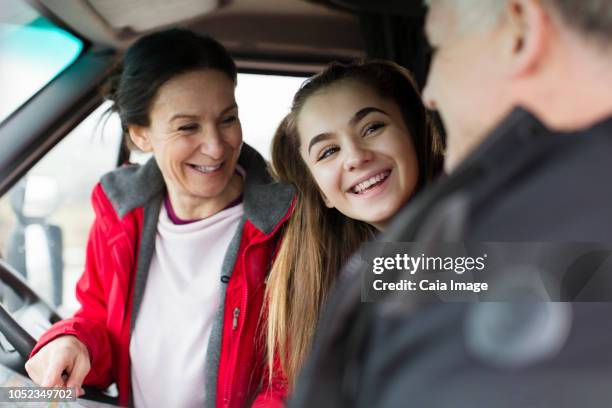family inside motor home - daughter car stock pictures, royalty-free photos & images