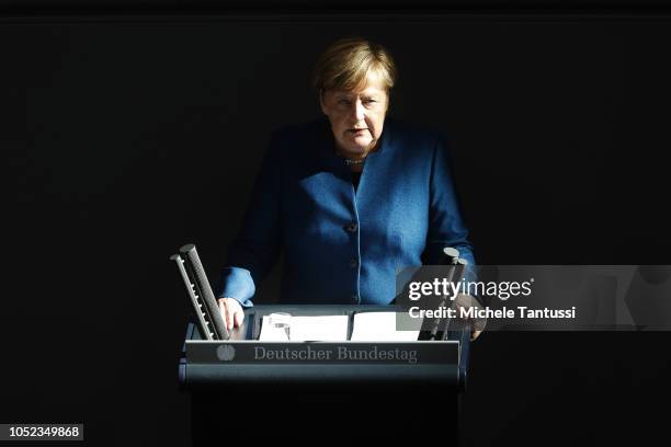 German Chancellor Angela Merkel gives a government declaration at the Bundestag prior to today's summit of European leaders at the European Council...