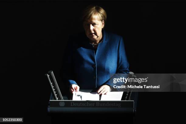 German Chancellor Angela Merkel gives a government declaration at the Bundestag prior to today's summit of European leaders at the European Council...