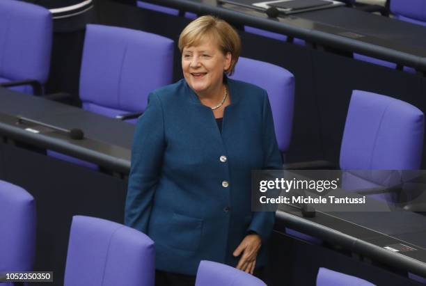 German Chancellor Angela Merkel arrives to give a government declaration at the Bundestag prior to today's summit of European leaders at the European...