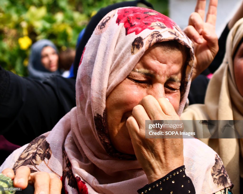 A woman seen crying during the funeral of martyr Naji Jamal...