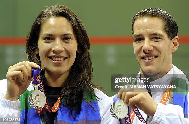 New Zealand's Joelle King and Martin Knight pose with their silver medals during the squash mixed doubles awards ceremony during the Commonwealth...