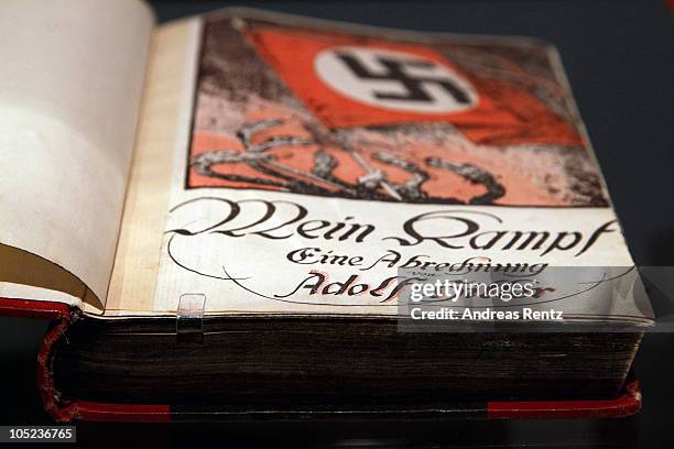 The book 'Mein Kampf' by Adolf Hitler is pictured during a press preview of 'Hitler and the Germans Nation and Crime' at Deutsches Historisches...