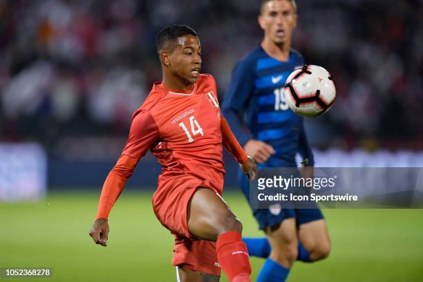 Peru forward Andy Polo battles for the ball in action during an international friendly match between the United States and Peru at Pratt & Whitney...