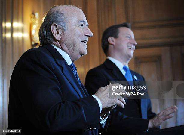 Prime Minister David Cameron looks on as President of FIFA Sepp Blatter speaks to the media at number 10 Downing Street on October 13, 2010 in...