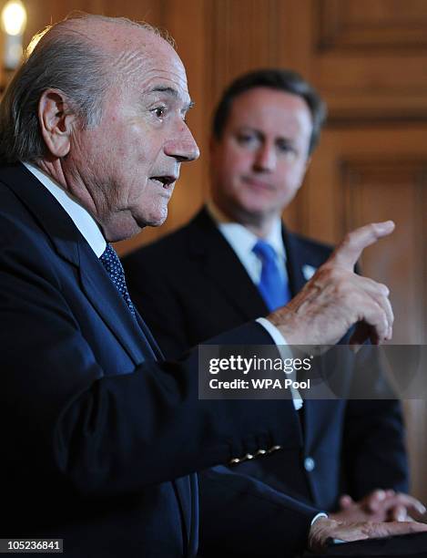 Prime Minister David Cameron looks on as President of FIFA Sepp Blatter speaks to the media at number 10 Downing Street on October 13, 2010 in...