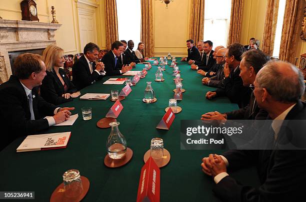 Prime Minister David Cameron and the current manager of the England national football team Fabio Capello speaks to the President of FIFA Sepp Blatter...