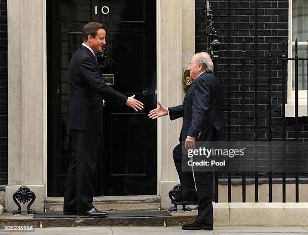 Prime Minister David Cameron and President of FIFA Sepp Blatter greet each other outside number 10 Downing Street on October 13, 2010 in London,...