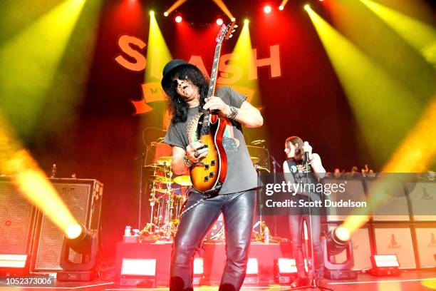 Guitarist Slash, founding member of Guns N' Roses perform onstage at Hollywood Palladium on October 16, 2018 in Los Angeles, California.