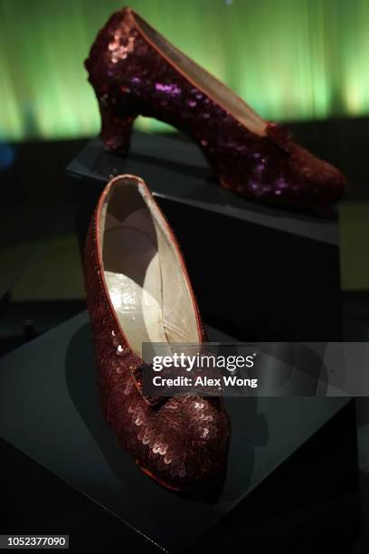 The "ruby slippers" which Judy Garland wore during the 1939 filming of The Wizard of Oz are put on display during a press preview for the exhibit...