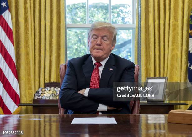 President Donald Trump speaks during a meeting about cutting business regulations in the Oval Office of the White House in Washington, DC, October...