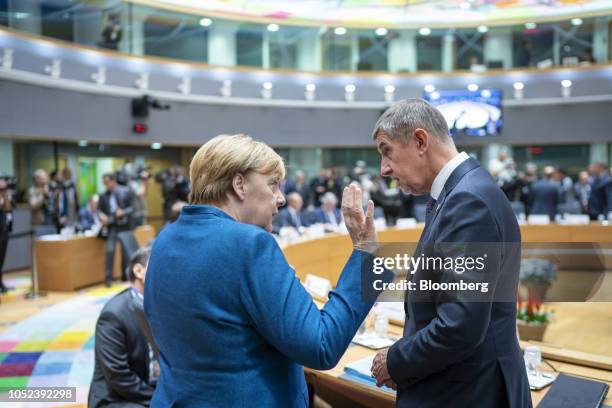 Angela Merkel, Germany's chancellor, left, speaks with Andrej Babis, Czech Republic's prime minister, during a European Union leaders Brexit summit...