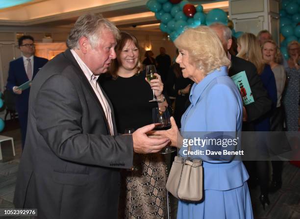 Nick Ferrari, Sandra Phylis Conolly and Camilla, Duchess of Cornwall, attend the launch of the "Fortnum & Mason Christmas & Other Winter Feasts"...