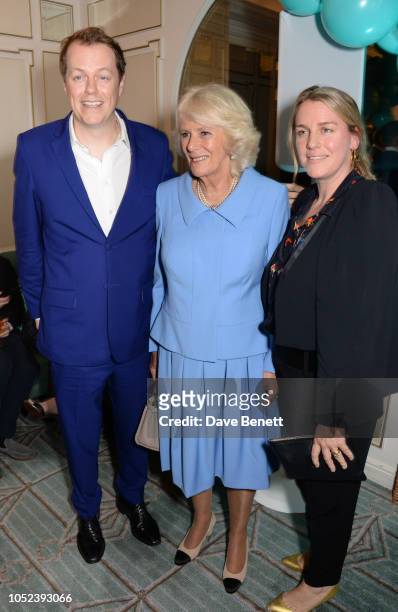 Tom Parker Bowles, Camilla, Duchess of Cornwall, and Laura Lopes attend the launch of the "Fortnum & Mason Christmas & Other Winter Feasts" cookbook...