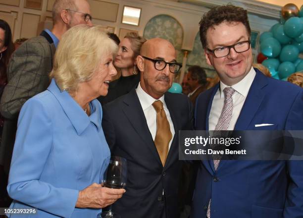 Camilla, Duchess of Cornwall, Stanley Tucci and Ewan Venters attend the launch of the "Fortnum & Mason Christmas & Other Winter Feasts" cookbook by...