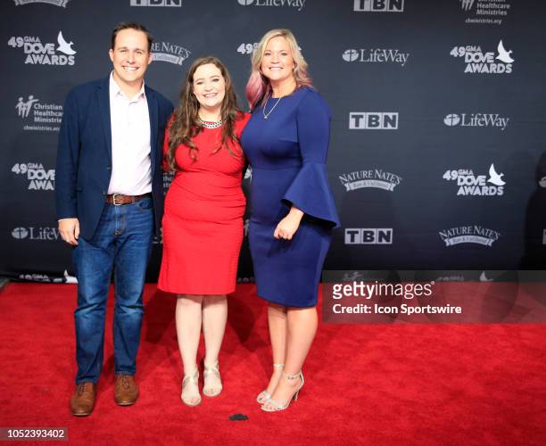 Alisen Wells, Anna Clark, and Nick Robertson arrive on the red carpet at the 49th Annual Dove Awards on October 16, 2018 at Allen Arena in Nashville,...