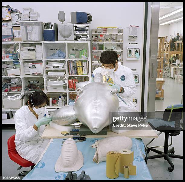 Artists working at Jeff Koons studio in New York City, NY, August 12, 2009.