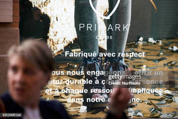 Primark's advertising reading 'Primark clothes, made with respect'. As Primark opened its biggest store in France in Toulouse, a collective called...